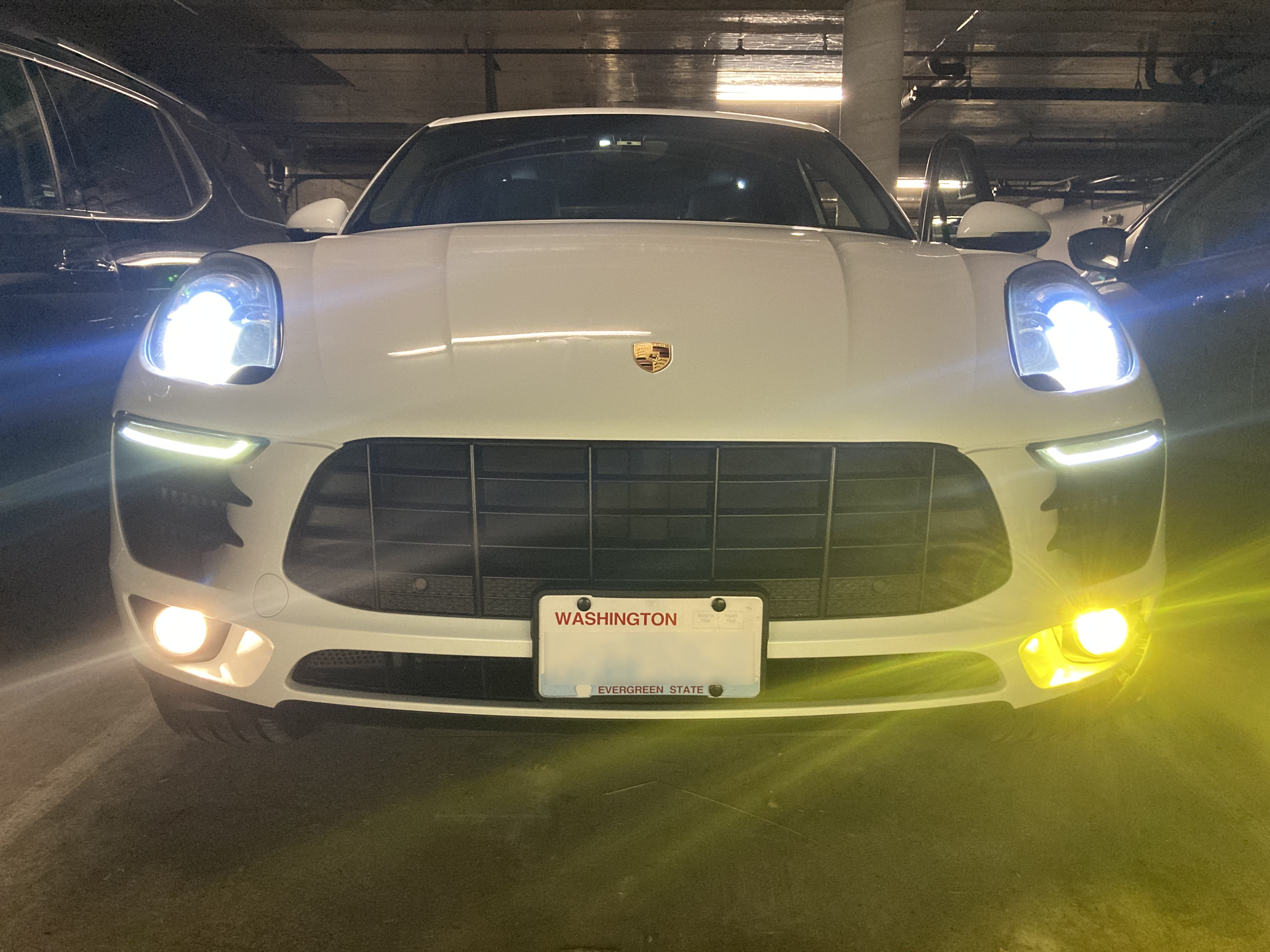Stock foig light on the left and the LED fog light on the right.